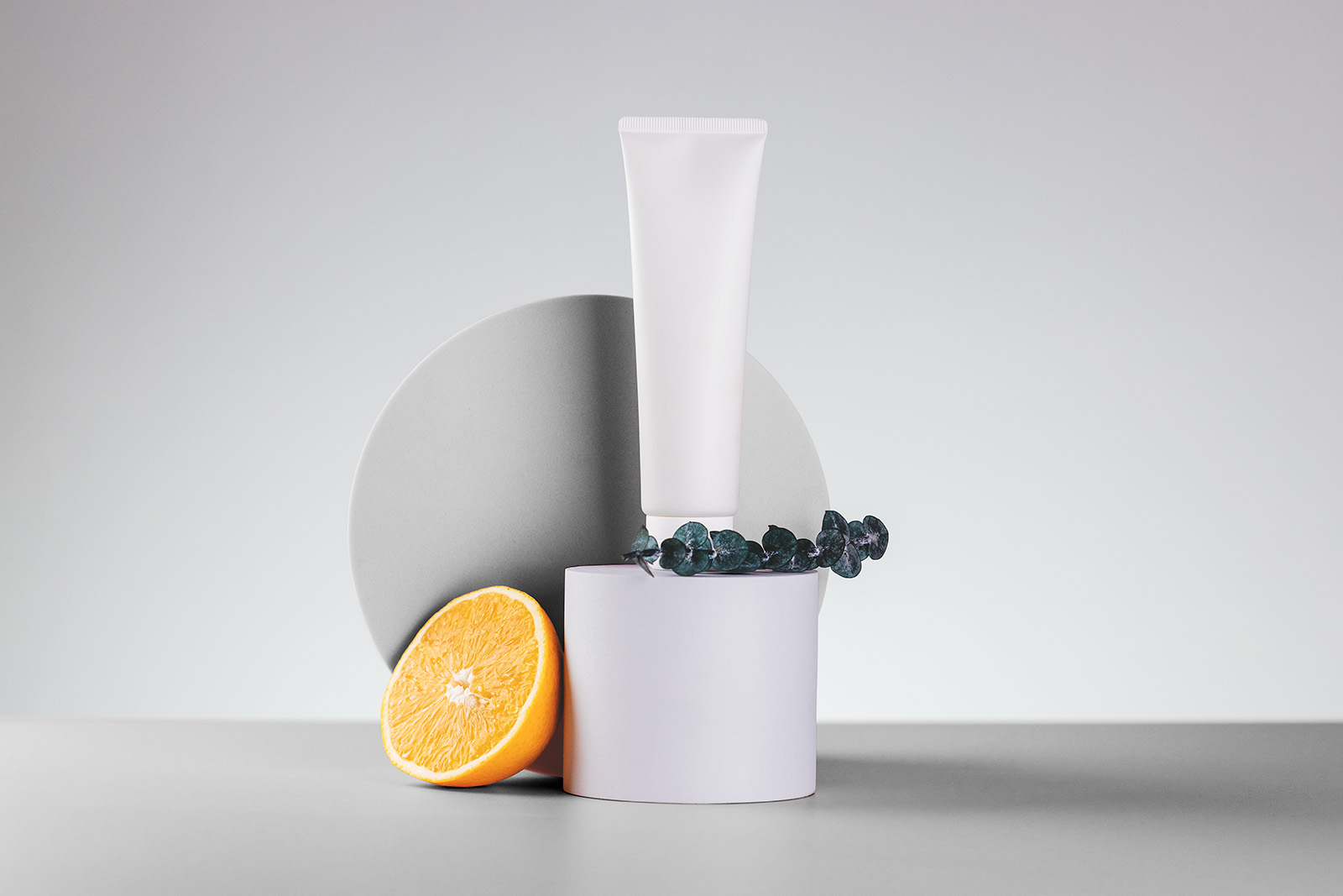 Cosmetic tube on podium mockup