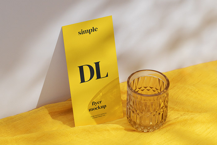 DL flyer on yellow fabric mockup