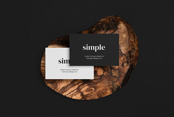 Two business cards with wood mockup